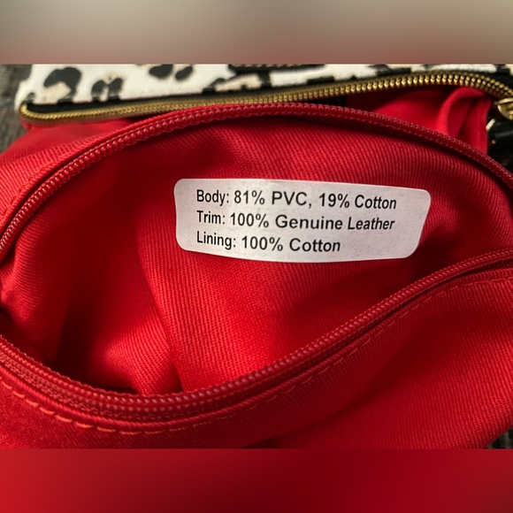 Dooney & Bourke Black/Leopard foldover zip crossbody. - Picture 14 of 15